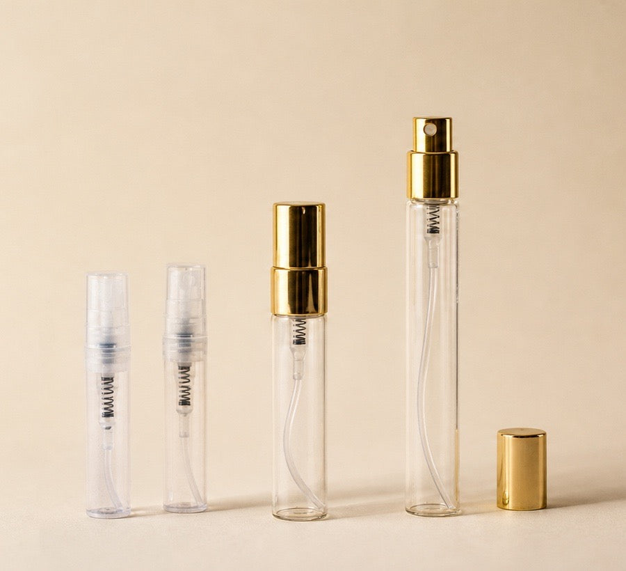 Perfume sample vial with fragrance ingredients in warm studio light